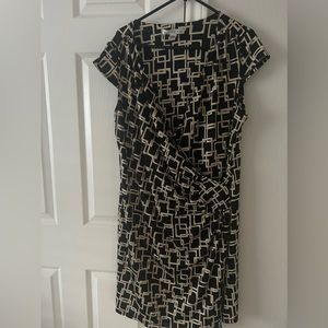 Ladies Black and Cream Cross Dress for any occasion.